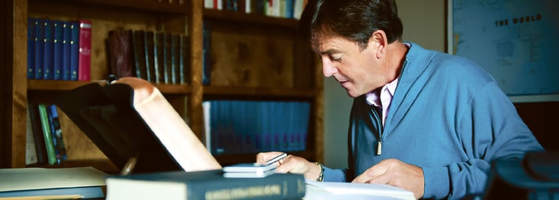 Alistair Begg at his desk Alistair Begg at his desk